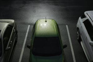 Green Car Parked in the darkness